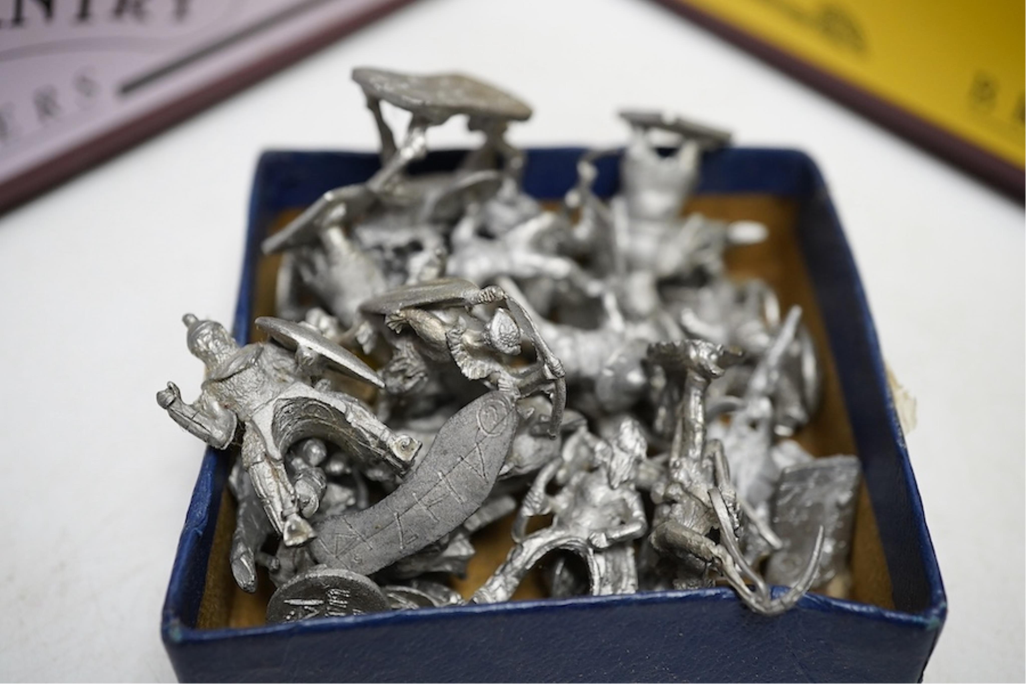 A collection of white metal models and kits intended for dioramas and war gaming, many still boxed or packeted, by manufacturers including Hinchcliffe Models, etc. in a variety of different scales.